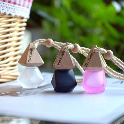 Wholesale 8ML Empty Car Air Freshener Mini Matte Frosted Color Car Hanging Glass Perfume Diffuser Bottle With Wooden Cap